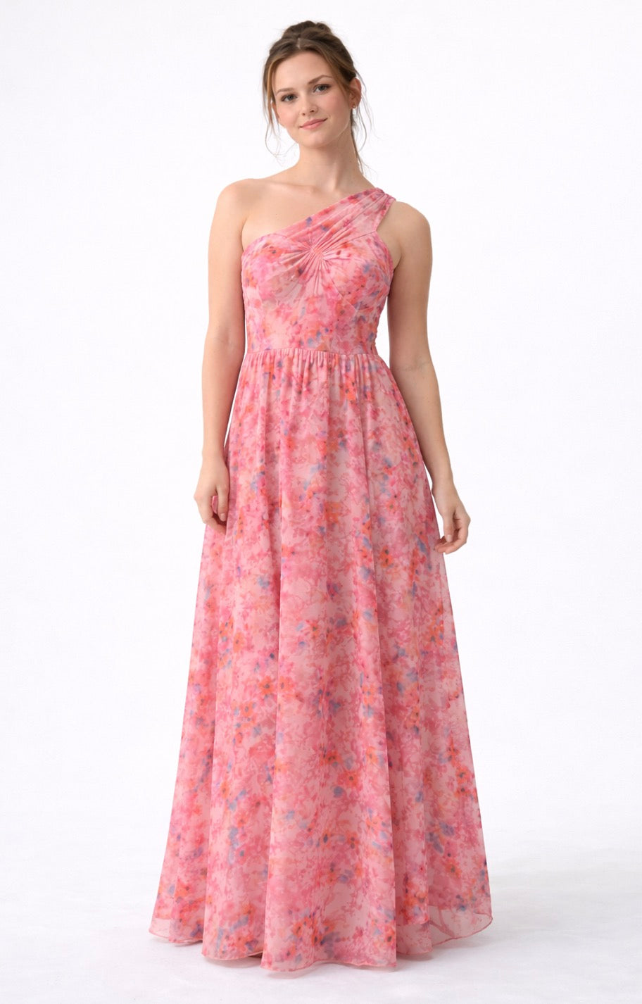 Woman wearing a floral one-shoulder dress on a white background